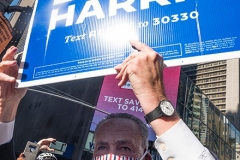 People gather in Times Square to celebrate the presidential election results that Joe Biden has defeated incumbent President Donald Trump.