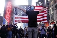 New Yorkers celebrate in Times Square the news that Joe Biden will be the 46th President of The United States.