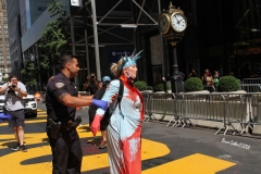 Juliet Germanotta age 39 dressed as Lady Liberty smears red paint on the Black Lives Matter mural in front of Trump Tower in Manhattan she was arrested and taken to the Midtown south precinct  . 8/23/2020