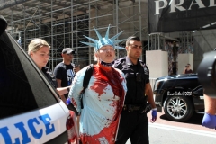 Juliet Germanotta age 39 dressed as Lady Liberty smears red paint on the Black Lives Matter mural in front of Trump Tower in Manhattan she was arrested and taken to the Midtown south precinct  . 8/23/2020