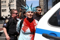 Juliet Germanotta age 39 dressed as Lady Liberty smears red paint on the Black Lives Matter mural in front of Trump Tower in Manhattan she was arrested and taken to the Midtown south precinct  . 8/23/2020