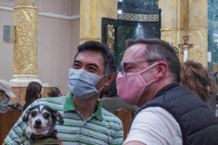 Animals and their humans await the ceremony inside the Church of St. Francis of Assisi in NYC for the Blessing of Animals that takes place every year on the first Sunday of October. 
In the Roman Catholic Church, St. Francis of Assisi is patron saint of animals, merchants and ecology.
People from all over bring their beloved furry and not so furry companions to receive blessings. This year broke an all time record of attendees who seek better horizons and better health for the upcoming year. (C) Bianca Otero, NYC. October 3, 2021.