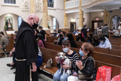 Animals and their humans await the ceremony inside the Church of St. Francis of Assisi in NYC for the Blessing of Animals that takes place every year on the first Sunday of October. 
In the Roman Catholic Church, St. Francis of Assisi is patron saint of animals, merchants and ecology.
People from all over bring their beloved furry and not so furry companions to receive blessings. This year broke an all time record of attendees who seek better horizons and better health for the upcoming year. (C) Bianca Otero, NYC. October 3, 2021.