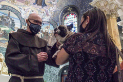 Animals and their humans receive blessings in the ceremony inside the Church of St. Francis of Assisi, NYC during the Blessing of Animals that takes place every year on the first Sunday of October. 
In the Roman Catholic Church, St. Francis of Assisi is patron saint of animals, merchants and ecology.
People from all over bring their beloved furry and not so furry companions to receive blessings. This year broke an all time record of attendees who seek better horizons and better health for the upcoming year. (C) Bianca Otero, NYC. October 3, 2021.