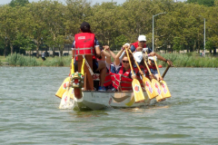 New York,  The Hong Kong Dragon Boat Festival in New York is an annual sporting and multicultural event held in August on Meadow Lake in Flushing Meadows Corona Park in Queens, New York to celebrate the fifth moon (or the fifth month) of the lunar calendar.  The festival hosts over 120 dragon boat teams from across North America, making it one of the largest dragon boat festivals in the United States.