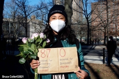 New York - Breonna Taylor Memorial and march to commemorate the one year anniversary of her death by police. Marchers held signs and red roses as they walk thru the streets of Brooklyn.