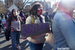 New York - Breonna Taylor Memorial and march to commemorate the one year anniversary of her death by police. Marchers held signs and red roses as they walk thru the streets of Brooklyn.