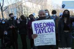 New York - Breonna Taylor Memorial and march to commemorate the one year anniversary of her death by police. Marchers held signs and red roses as they walk thru the streets of Brooklyn.