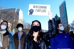 New York - Breonna Taylor Memorial and march to commemorate the one year anniversary of her death by police. Marchers held signs and red roses as they walk thru the streets of Brooklyn.