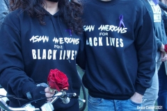 New York - Breonna Taylor Memorial and march to commemorate the one year anniversary of her death by police. Marchers held signs and red roses as they walk thru the streets of Brooklyn.