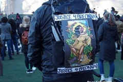 New York - Breonna Taylor Memorial and march to commemorate the one year anniversary of her death by police. Marchers held signs and red roses as they walk thru the streets of Brooklyn.