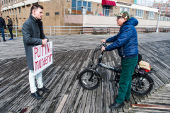 Russian and Ukrainian residents as well as other Slavic nationalities came together to protest the Russian War on Ukraine at Brighton Beach, Brooklyn. 

New York City has the largest Ukrainian, Russian and Slavic concentrated population in one area with in the United States. 
Sunday, March 6, 2022. (C) Bianca Otero