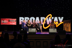 Andrea Ambam(l) moderates a panel of actors (l-r) Rachel Dratch, Julianne Hough, Suzy Nakamura, and Lea DeLaria during BroadwayCon 2022 at The Manhattan Center in New York, NY, July 8, 2022.