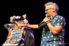 BroadwayCon Cabaret. Ben Cameron(l) dressing up Anthony Repp(r) using props from the audience props on the stage at The Manhattan Center in New York, NY, July 8, 2022.