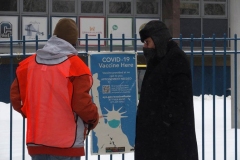 NEW YORK—? Covid Vaccine site located  in a Brooklyn high school. Elderly and eligible N.Y.C. personnel brave snow storm to get vaccinated.