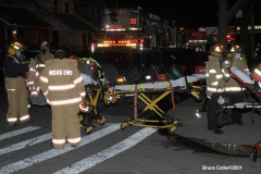 New York City. FDNY personnel extinguish a garage fire on East 29th Street and Kings Highway.