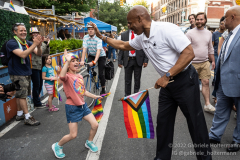 NYC Mayor Eric Adams  greets a young parade reveler during the Brooklyn Pride Parade in Brooklyn, New York on June 11,  2022.  (Photo by Gabriele Holtermann/Sipa USA)
