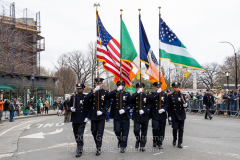 The NYPD Color Guard marches in the St. Patrick's Day Parade in the Park Slope neighborhood of Brooklyn, NY, on Mar. 20, 2022. (Photo by Gabriele Holtermann)