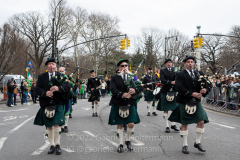 A bagpipe and drum band marches in the St. Patrick's Day Parade in the Park Slope neighborhood of Brooklyn, NY, on Mar. 20, 2022. (Photo by Gabriele Holtermann)