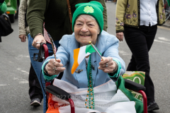 Brooklynites enjoy the return of the St. Patrick's Day Parade in the Park Slope neighborhood of Brooklyn, NY, on Mar. 20, 2022. (Photo by Gabriele Holtermann)