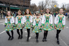 An Irish dance group  marches in the St. Patrick's Day Parade in the Park Slope neighborhood of Brooklyn, NY, on Mar. 20, 2022. (Photo by Gabriele Holtermann)