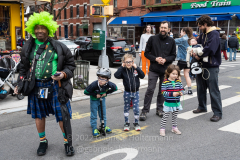 Brooklynites enjoy the return of the St. Patrick's Day Parade in the Park Slope neighborhood of Brooklyn, NY, on Mar. 20, 2022. (Photo by Gabriele Holtermann)