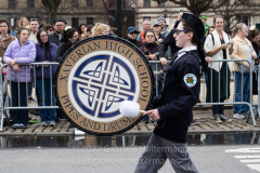 A member of the Xaverian High School Pipes and Drums band marches in the St. Patrick's Day Parade in the Park Slope neighborhood of Brooklyn, NY, on Mar. 20, 2022. (Photo by Gabriele Holtermann)