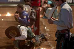 PBR Bull Riders pause for prayer before competing in the PBR’s (Professional Bull Riders) Elite Unleash The Beast event at the Prudential Center in Newark NJ on September 19, 2021. (Photo by Andrew Schwartz)
