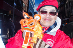Sliwa and Guardian Angels took part in the parade. Details and people of the NYC Chinese New Year Parade in Chinatown, NYC.  Sunday, February 20, 2022 (C) Bianca Otero