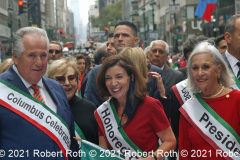 Gov. Kathy Hochul marches along with Columbus Day Parade officials.