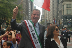 Mayor Bill de Blasio joined in the parade despite facing backlash over his decision to rename the school holiday Indigenous Peoples' Day.