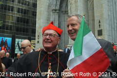 Cardinal Timothy Dolan and Mayor Bill de Blasio greet members of the media outside St. Patrick's Cathedral, a central point of the parade route.