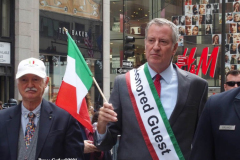 New York,  77th Columbus Day Parade returns to New York City. after it was cancelled last year due to Covid. Marchers and Bands walk up 5th ave.  NYC Mayor Bill de Blasio