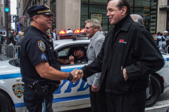 Actor "Chazz" Palminteri greets police officer, Midtown, Manhattan, NYC.

The annual Columbus Parade in NYC took place on between 42nd and 72nd on 5th avenue again this year, after last year’s COVID hiatus, attracting thousands of spectators to watch. The festivities were filled with an abundance of floats and key figure participants in the iconic parade also known as;  “US’s biggest Italian-American Heritage Parade.” 
President Biden also commemorated both today as both Columbus Day and National Indigenous Day.     (C) Bianca Otero. NYC. October 10, 2021.