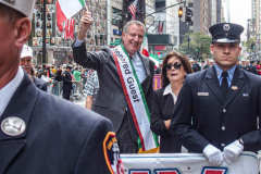 NYC Mayor Bill Di’Blasio waves an Italian flag while walking with the FDNY section of the the annual Columbus Parade in NYC which took place on between 42nd and 72nd on 5th avenue again this year, after last year’s COVID hiatus, attracting thousands of spectators to watch. The festivities were filled with an abundance of floats and key figure participants in the iconic parade also known as;  “US’s biggest Italian-American Heritage Parade.” 
President Biden also commemorated both today as both Columbus Day and National Indigenous Day.     (C) Bianca Otero. NYC. October 10, 2021.