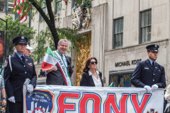 NYC Mayor Bill Di’Blasio waves an Italian flag while walking with the FDNY section of the the annual Columbus Parade in NYC which took place on between 42nd and 72nd on 5th avenue again this year, after last year’s COVID hiatus, attracting thousands of spectators to watch. The festivities were filled with an abundance of floats and key figure participants in the iconic parade also known as;  “US’s biggest Italian-American Heritage Parade.” 
President Biden also commemorated both today as both Columbus Day and National Indigenous Day.     (C) Bianca Otero. NYC. October 10, 2021.