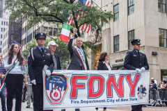 NYC Mayor Bill Di’Blasio waves an Italian flag while walking with the FDNY section of the the annual Columbus Parade in NYC which took place on between 42nd and 72nd on 5th avenue again this year, after last year’s COVID hiatus, attracting thousands of spectators to watch. The festivities were filled with an abundance of floats and key figure participants in the iconic parade also known as;  “US’s biggest Italian-American Heritage Parade.” 
President Biden also commemorated both today as both Columbus Day and National Indigenous Day.     (C) Bianca Otero. NYC. October 10, 2021.