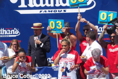 July 4  2022  NEW YORK  
Nathan's Famous Fourth of July International Hot Dog Eating Contest held at the corner of Surf ave. and Stillwell ave. where the original Nathan's Hot Dog stand opened over a hundred years ago. Miki Sudo winner eating 40 hot dogs and buns and in second place Michelle Lesco last years winner.