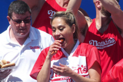 July 4  2022  NEW YORK  
Nathan's Famous Fourth of July International Hot Dog Eating Contest held at the corner of Surf ave. and Stillwell ave. where the original Nathan's Hot Dog stand opened over a hundred years ago. Miki Sudo winner eating 40 hot dogs and buns and in second place Michelle Lesco last years winner.