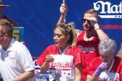 July 4  2022  NEW YORK  
Nathan's Famous Fourth of July International Hot Dog Eating Contest held at the corner of Surf ave. and Stillwell ave. where the original Nathan's Hot Dog stand opened over a hundred years ago. Miki Sudo winner eating 40 hot dogs and buns and in second place Michelle Lesco last years winner.