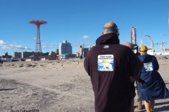 Coney Island Brooklyn. The Coney Island Polar Bear Club jumped into the Atlantic Ocean for their weekly swim. The air temperature was 37 degrees while the water temperature was 43 degrees, Onlookers were bundled up from the wind and cold.