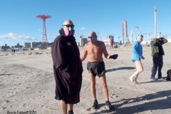 Coney Island Brooklyn. The Coney Island Polar Bear Club jumped into the Atlantic Ocean for their weekly swim. The air temperature was 37 degrees while the water temperature was 43 degrees, Onlookers were bundled up from the wind and cold.