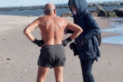 Coney Island Brooklyn. The Coney Island Polar Bear Club jumped into the Atlantic Ocean for their weekly swim. The air temperature was 37 degrees while the water temperature was 43 degrees, Onlookers were bundled up from the wind and cold.