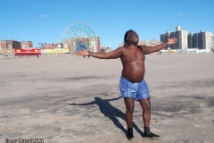 Coney Island Brooklyn. The Coney Island Polar Bear Club jumped into the Atlantic Ocean for their weekly swim. The air temperature was 37 degrees while the water temperature was 43 degrees, Onlookers were bundled up from the wind and cold.