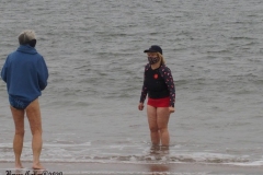 December 20,2020    Coney Island Polar Bears go for their weekly swim. Snow covers the sand because of the snow storm that happened a few days before the swim. The outdoor temperature was 37 degrees and the water temperature is 52 degrees.