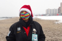 December 20,2020    Coney Island Polar Bears go for their weekly swim. Snow covers the sand because of the snow storm that happened a few days before the swim. The outdoor temperature was 37 degrees and the water temperature is 52 degrees.