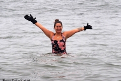 December 20,2020    Coney Island Polar Bears go for their weekly swim. Snow covers the sand because of the snow storm that happened a few days before the swim. The outdoor temperature was 37 degrees and the water temperature is 52 degrees.