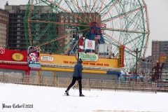 December 20,2020    Coney Island Polar Bears go for their weekly swim. Snow covers the sand because of the snow storm that happened a few days before the swim. The outdoor temperature was 37 degrees and the water temperature is 52 degrees.