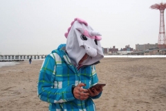 December 20,2020    Coney Island Polar Bears go for their weekly swim. Snow covers the sand because of the snow storm that happened a few days before the swim. The outdoor temperature was 37 degrees and the water temperature is 52 degrees.