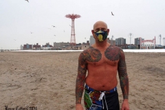December 20,2020    Coney Island Polar Bears go for their weekly swim. Snow covers the sand because of the snow storm that happened a few days before the swim. The outdoor temperature was 37 degrees and the water temperature is 52 degrees.